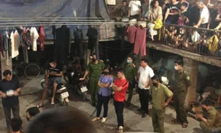 Công an xuất hiện tại dãy trọ khi nhận được tin báo. Ảnh: Giao thông Quốc gia