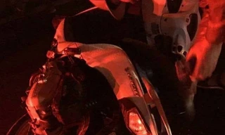 Chiếc xe máy của nạn nhân tại hiện trường