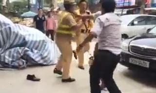 Đạp người vi phạm, đại úy CSGT phải bồi thường 20 triệu đồng