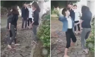 Nữ sinh đánh bạn. Ảnh cắt từ clip