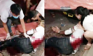 Nam thanh niên được các nhân viên y tế cấp cứu tại hiện trường