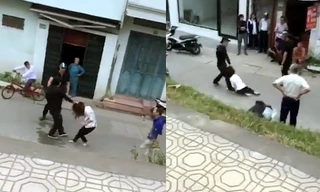 Cô gái bị túm tóc, kéo lê dưới đường. Ảnh cắt từ clip