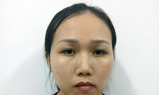 Nghi phạm Tuyền tại cơ quan công an