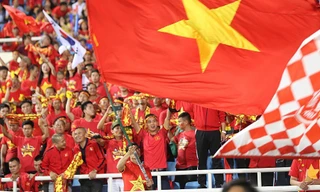 Cổ động viên Việt Nam được báo chí quốc tế khen ngợi là vô cùng cuồng nhiệt. Ảnh: Sputnik