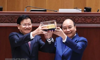 Hình ảnh Chủ tịch nước dự Lễ bàn giao Tòa Nhà Quốc hội mới cho Lào 