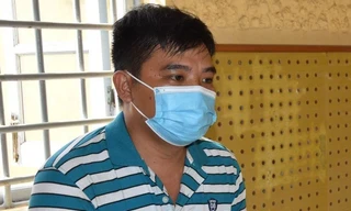 Lê Văn Tiểu tại cơ quan công an.