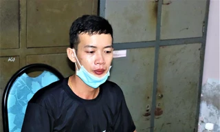 Nghi phạm Lý Văn Phương tại cơ quan công an