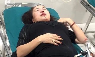 Bà Mai Thị Hồng Thức bị truy sát phải nhập viện.