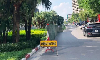 Yêu cầu các đơn vị thi công chỉ được xén dải phân cách vào ban đêm. Ảnh: A.Trọng