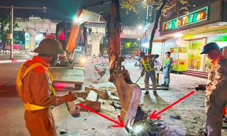 Soi đèn trong đêm để xén dải phân cách, mở rộng nút giao chống ùn tắc tại Hà Nội 