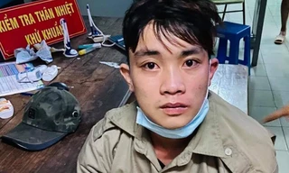 Thanh niên mặc đồng phục bảo vệ dân phố, cầm gậy chặn xe vòi tiền