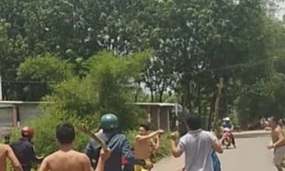 Bị dân vây bắt, tên trộm nổ súng hòng thoát thân