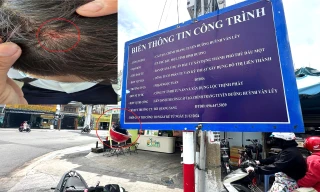 Nhiều người đi đường bị chảy máu đầu vì bảng thông tin công trình trên vỉa hè 