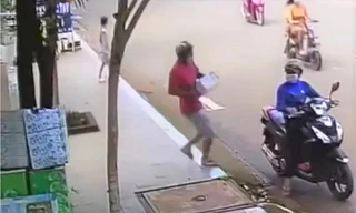 Đôi nam nữ ôm thùng bia bỏ chạy khi đang giãn cách gây xôn xao cộng đồng mạng