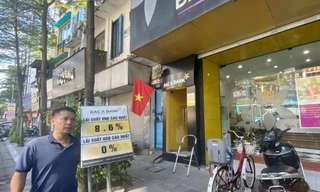 Lãi suất 'làm khó' chứng khoán, bất động sản