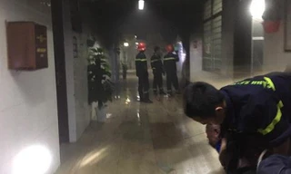 Hiện trường vụ cháy và nghi can khi bị khống chế