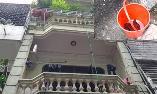 Cháy nhà 4 tầng, bé 5 tháng tuổi được cho vào xô thả xuống thoát hiểm