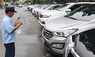 TPHCM vẫn thu phí dừng đỗ ô tô theo cách truyền thống