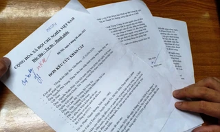 Đơn kêu cứu của gia đình anh Phạm Thanh QuangẢnh: Kim Sơn 