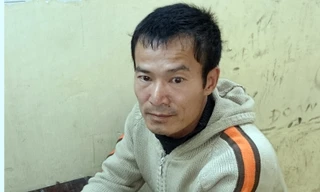 Nguyễn Quang Tuấn tại cơ quan công an.