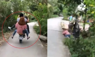 Nam thanh niên chở theo cô gái bốc đầu xe máy ngã xuống đường