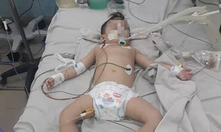 Bé H.H.Ng. đang hôn mê tại bệnh viện