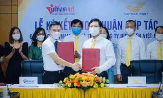 Lễ ký thỏa thuận hợp tác giữa Tổng Công ty Bưu điện Việt Nam (Vietnam Post) và Báo VietNamNet