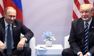 Tổng thống Mỹ Donald Trump (phải) và Tổng thống Nga Vladimir Putin (trái) hội đàm riêng bên lề thượng đỉnh G20. Ảnh: REUTERS