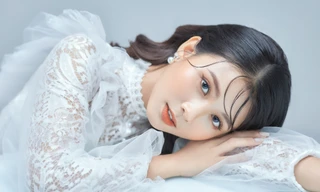 Nữ sinh điện ảnh gây ấn tượng bởi bộ ảnh Tết bên áo Tấc Việt phục