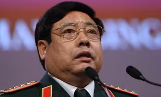 Bộ trưởng Quốc phòng Phùng Quang Thanh. Ảnh: How Hwee Young, EPA.