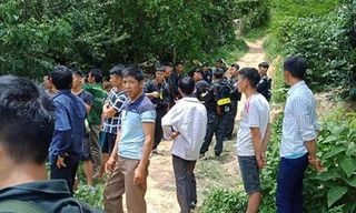 Cơ quan chức năng truy bắt hung thủ. Ảnh Quốc Khánh.