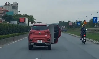 Xử phạt, tước giấy phép lái xe nữ tài xế mở cửa ô tô khi đi trên Quốc lộ 1A 