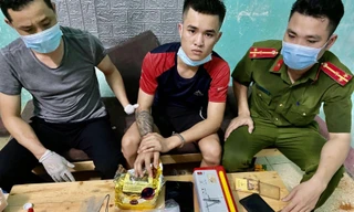 Thả chó dữ tấn công cảnh sát khi bị vây bắt