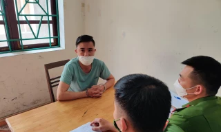 Đối tượng Minh tại cơ quan công an.