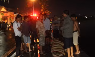 Triều cường dâng cao, người phụ nữ rơi xuống hồ chết thương tâm