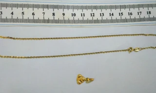 Người đàn bà U70 giật dây chuyền bé 2 tuổi