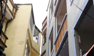 Thần đèn giải cứu hai nhà cao tầng bị nghiêng lún