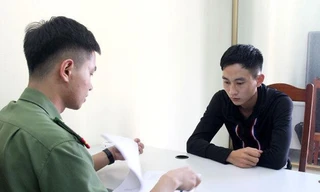 Đối tượng Đào Văn Thái (bìa phải) -Ảnh: Duy Chiến 