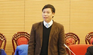 Ông Điều Bá Được phát biểu tại một Hội thảo về việc sửa đổi Luật BHXH