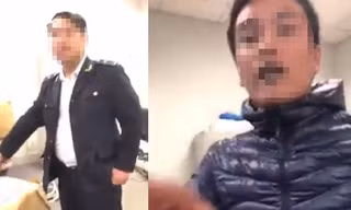 Hai cán bộ Hải quan Nội Bài bị tố có tác phong, thái độ chưa chuẩn mực với hành khách. (Ảnh: Chụp từ clip)