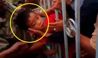 Vắt não tìm cách cứu bé trai kẹt đầu vào cổng sắt và cái kết bất ngờ