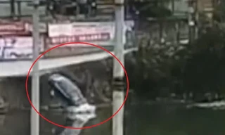 Tài xế đạp nhầm chân ga, ôtô bay thẳng xuống sông