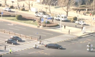 Đoàn xe tháp tùng lãnh đạo Triều Tiên Kim Jong Un ở Bắc Kinh