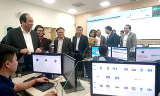 Đoàn công tác của Thủ tướng do Bộ trưởng, Chủ nhiệm Văn phòng Chính phủ Mai Tiến Dũng dẫn đầu thăm và làm việc với BHXH Việt Nam tháng 10/2018. Ảnh: Phạm Thanh.