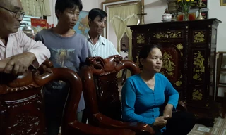 Bà Hoàng vợ của ông Khai.