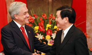 Chủ tịch nước Trương Tấn Sang (phải) và Tổng thống Chile Sebastián Piđra Echenique Ảnh: TTXVN