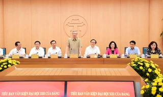 Đồng chí Trần Quốc Vượng, Ủy viên Bộ Chính trị, Thường trực Ban Bí thư, Phó Trưởng bộ phận Thường trực Tiểu ban Văn kiện Đại hội XIII, Trưởng đoàn công tác chủ trì hội nghị làm việc với Hà Nội sáng 27/4