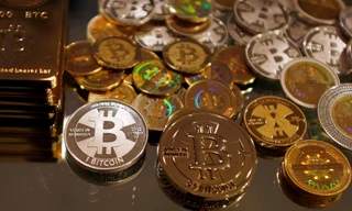 Đồng Bitcoin. Nguồn: Bloomberg)