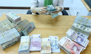 Thị trường quốc tế cũng như các đồng tiền chủ chốt có thể sẽ có nhiều biến động trong thời gian tới, khi cuộc chiến thương mại giữa Mỹ - Trung Quốc vẫn diễn biến phức tạp - Ảnh: Quang Phúc.