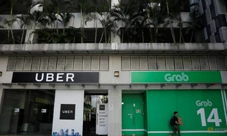 Một góc văn phòng của Uber và Grab chụp vào ngày 26/3/2018. Ảnh: Reuters